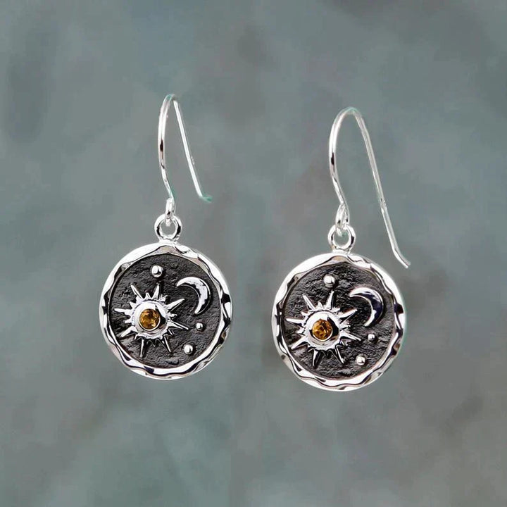 Bohemiska silverörhängen med måne- och soldesign