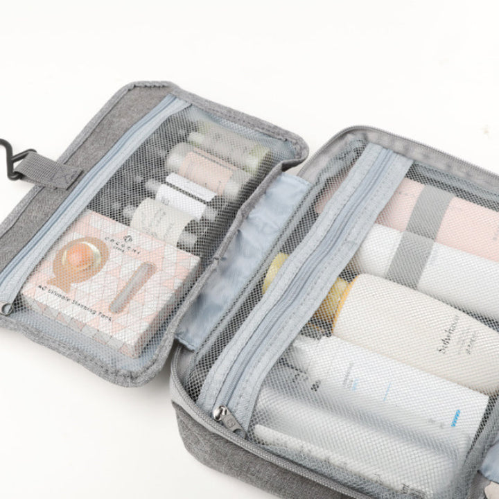 Travelique reseorganizer för kosmetika | Kompakt och vattentät | Med 4 fack och 360°-krok | För kvinnor och män