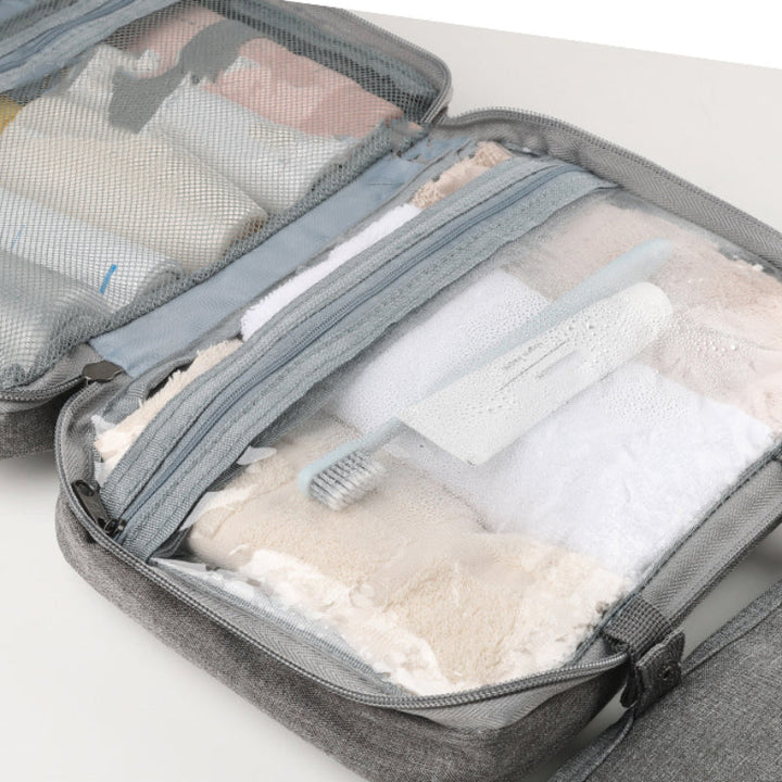 Travelique reseorganizer för kosmetika | Kompakt och vattentät | Med 4 fack och 360°-krok | För kvinnor och män
