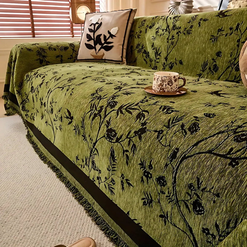 Elegant pledd med blomsterdesign og frynser