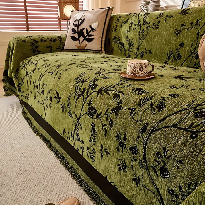 Elegant pledd med blomsterdesign og frynser