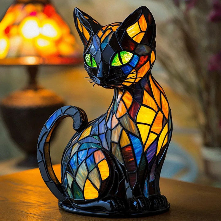 Dekorativ kattformad lampa med mosaikdesign och varmt stämningsljus – elegant heminredning