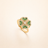 Elegant guldring med roterande klöverblad