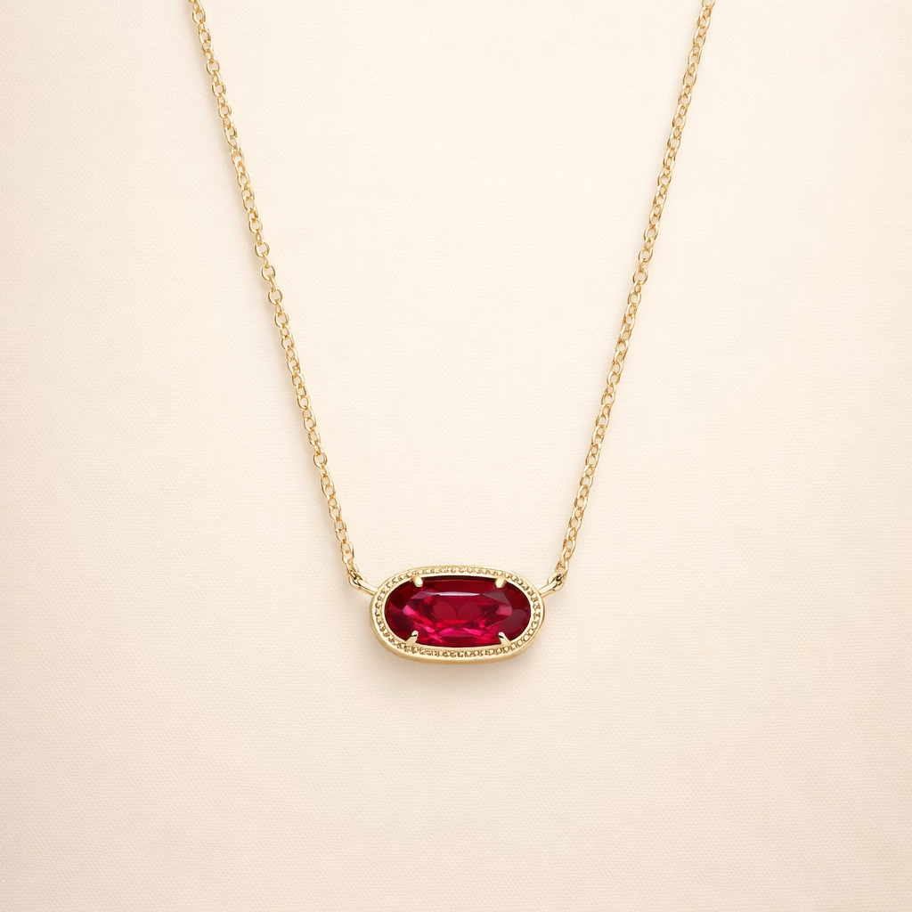 Elegant guldhalsband med oval rubin