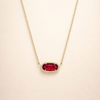 Elegant guldhalsband med oval rubin