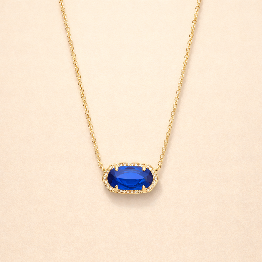 Elegant guldhalsband med oval safir