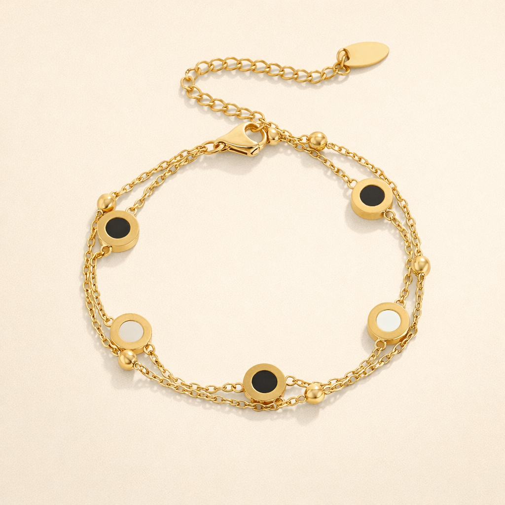 Elegant armband med onyx och vit sten