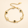 Elegant armband med onyx och vit sten