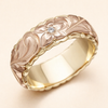 Elegant guldring med rosblomsdesign