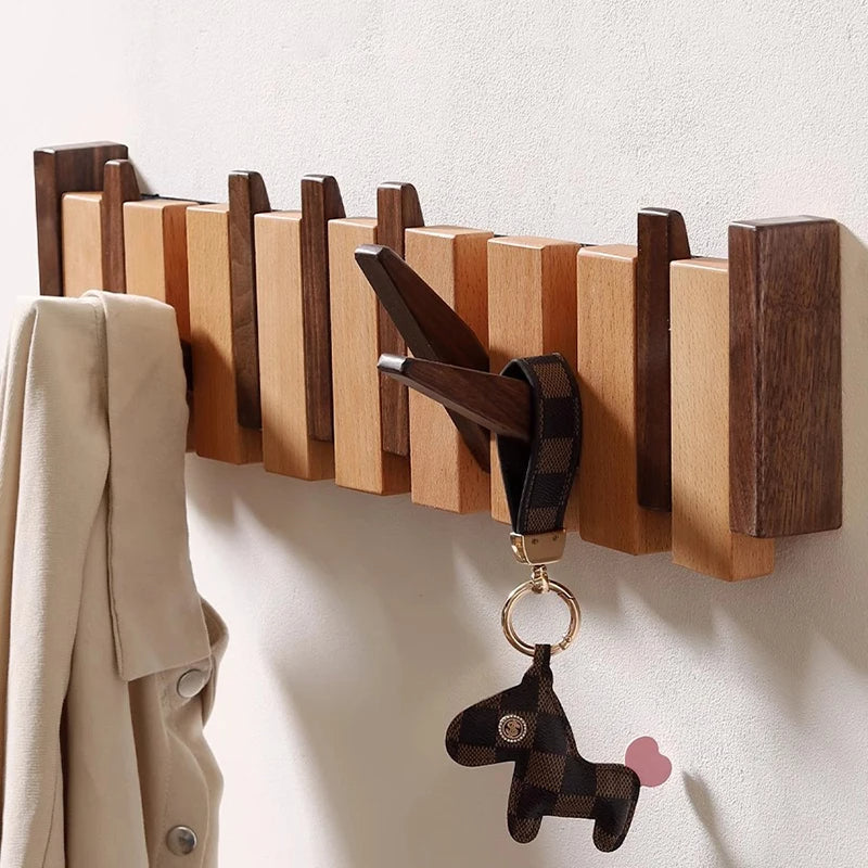 Klädhängare i trä för väggmontering – fällbara krokar med minimalistisk design