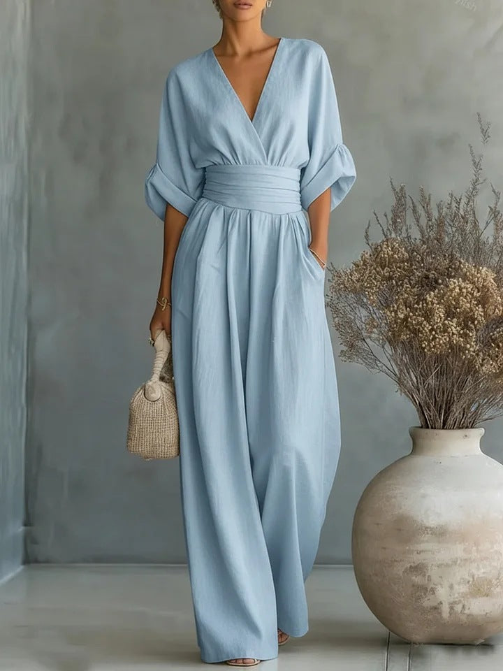 Elegant jumpsuit för dam med V-ringning och vida byxben i hög midja