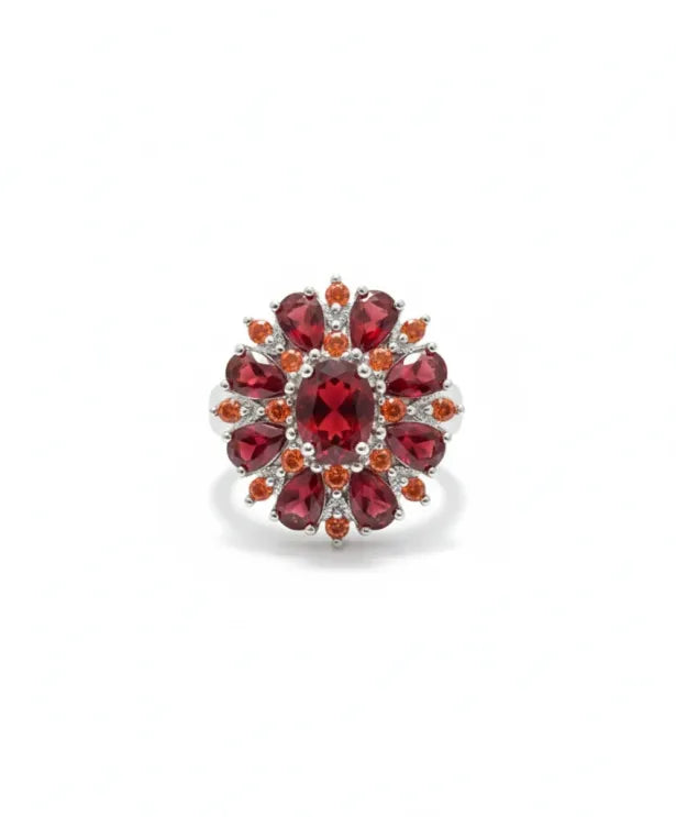 Elegant guldring med scharlakansröda blomblad