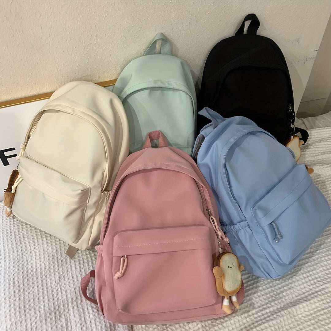 Lätt skolryggsäck i nylon för dam i pastellfärger