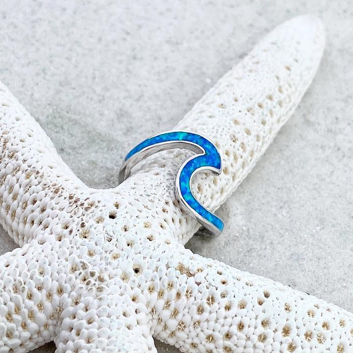 Silverring med opal och böljande former
