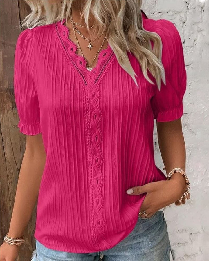 Elegant bluse med V-udskæring og blonder
