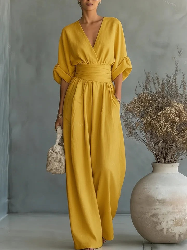 Elegant jumpsuit för dam med vida ben, V-ringning och flödande snitt