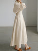 Elegant maxikjole med sofistikert drapering