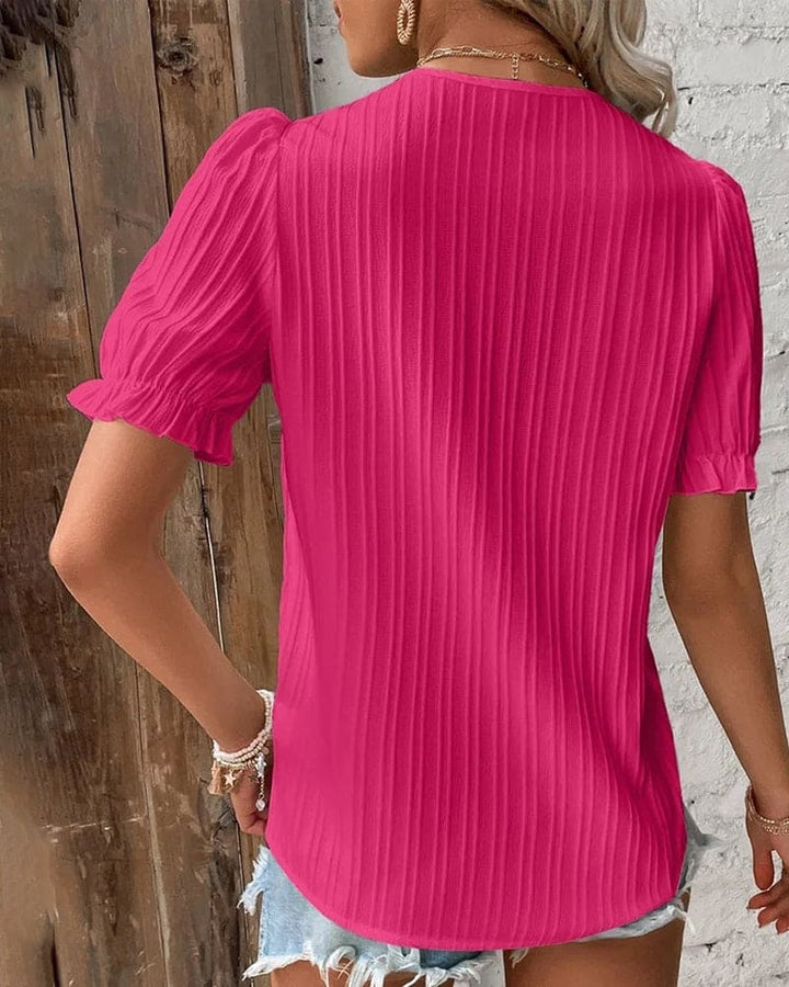 Elegant bluse med V-udskæring og blonder