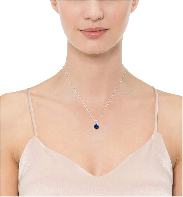 Elegant halsband i vitguld med rundslipad safir