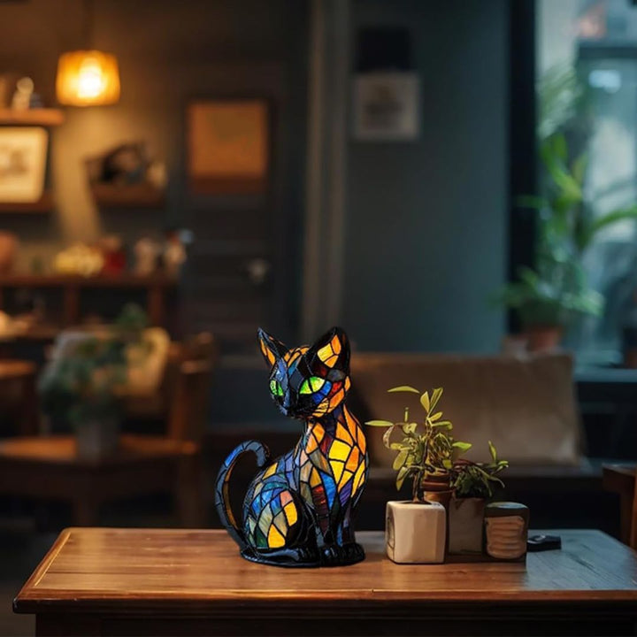 Dekorativ kattformad lampa med mosaikdesign och varmt stämningsljus – elegant heminredning