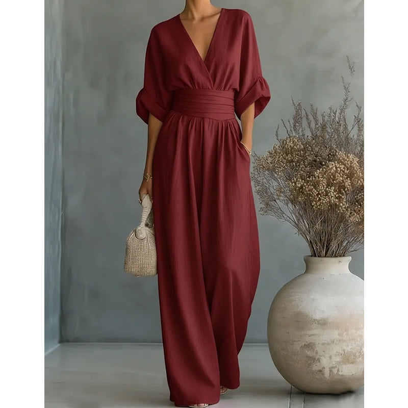 Elegant jumpsuit för dam med vida ben, V-ringning och flödande snitt