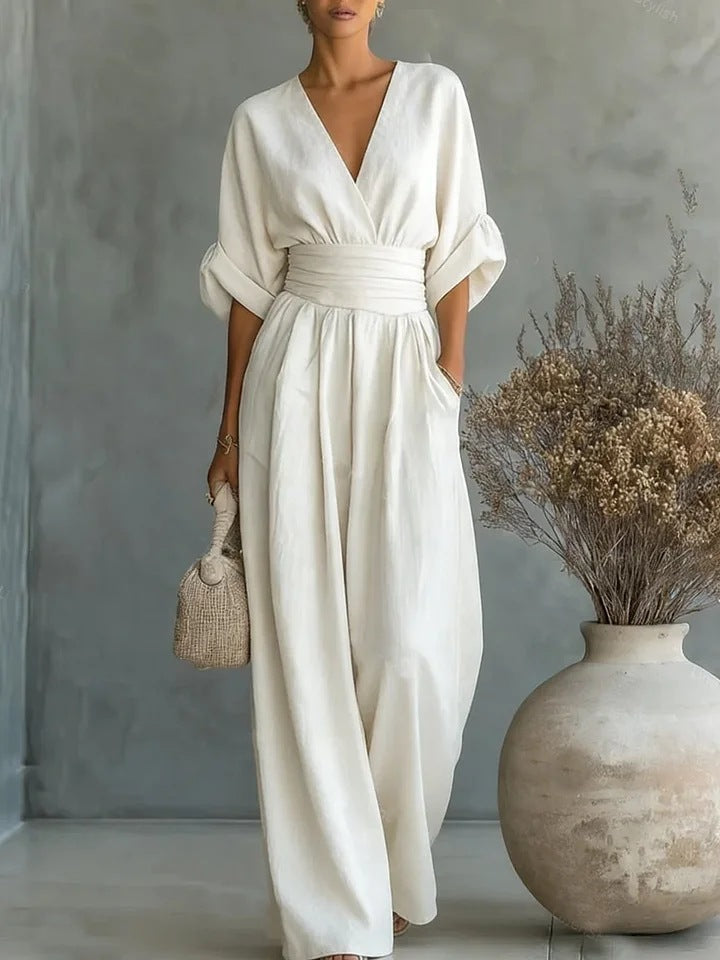 Elegant jumpsuit för dam med vida ben, V-ringning och flödande snitt