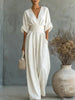 Elegant jumpsuit för dam med vida ben, V-ringning och flödande snitt