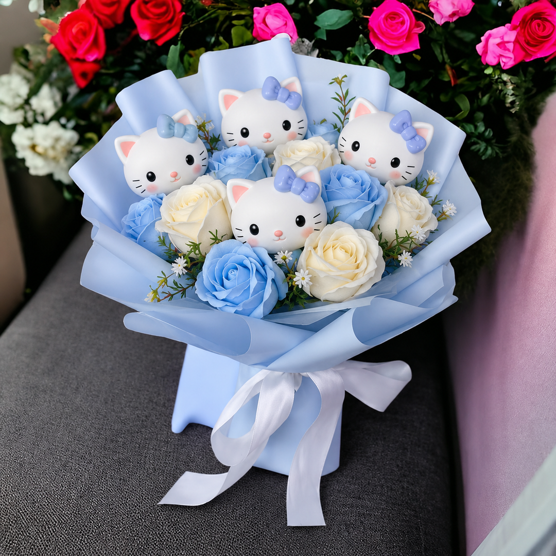 Bukett med färgglada konstgjorda blommor och Kitty-figurer för presenter och dekoration