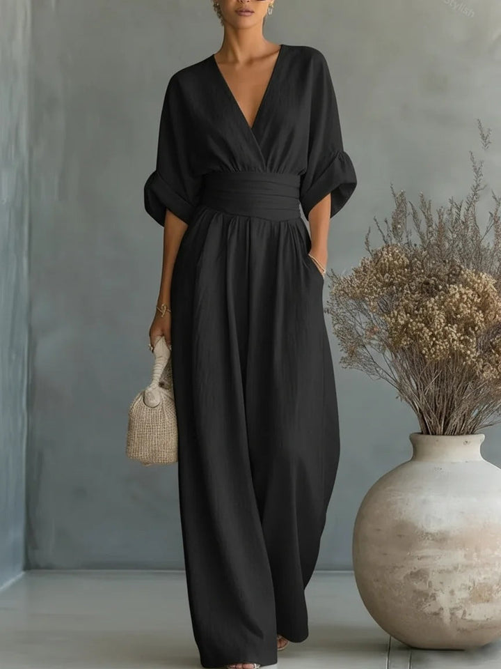 Elegant jumpsuit för dam med vida ben, V-ringning och flödande snitt