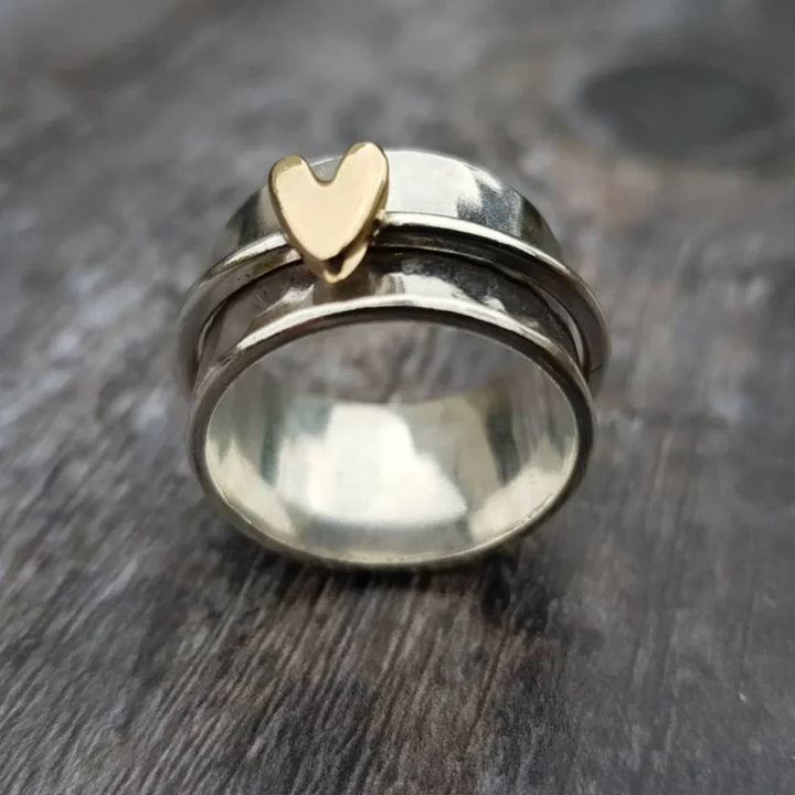Silverring med guldhjärta