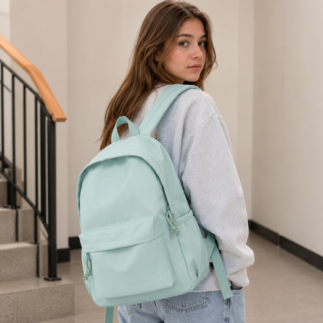 Lätt skolryggsäck i nylon för dam i pastellfärger