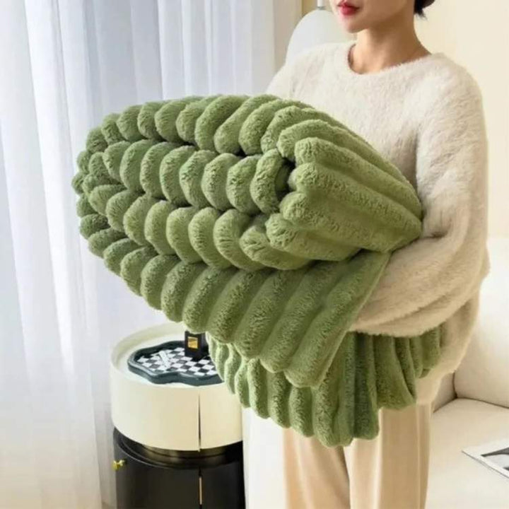 Pläd av plysch, mjuk och varm med randig design