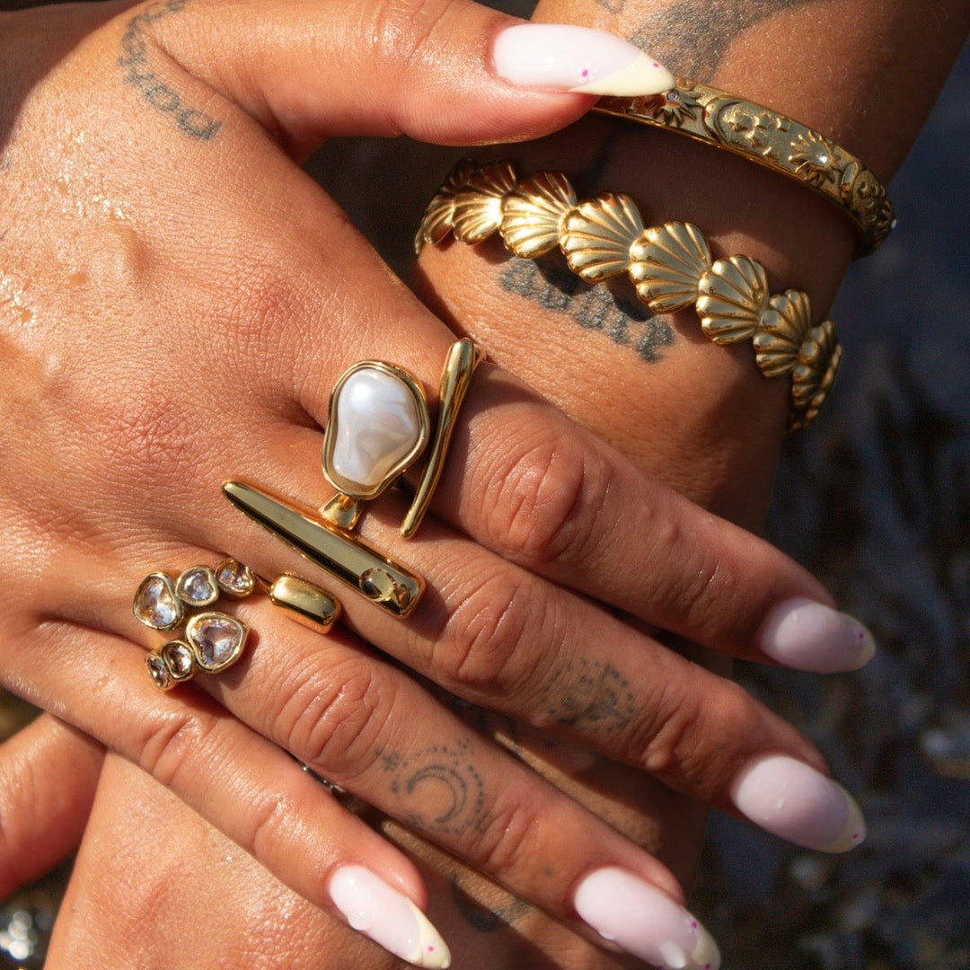 Axis – justerbar skulptural guldring