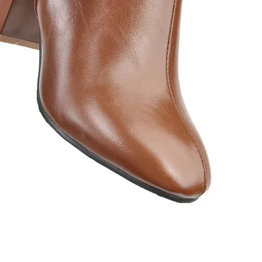 Damstövlar med knähöjd och klack och dragkedja Elegant design möter vardagskomfort