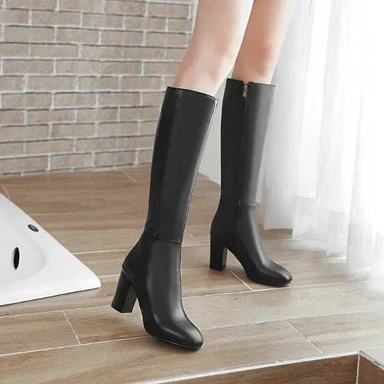 Damstövlar med knähöjd och klack och dragkedja Elegant design möter vardagskomfort