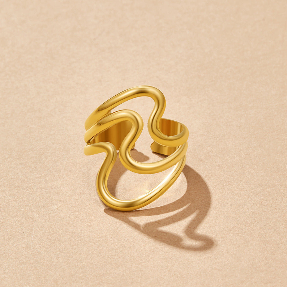Wrap-ring i guld med vågor