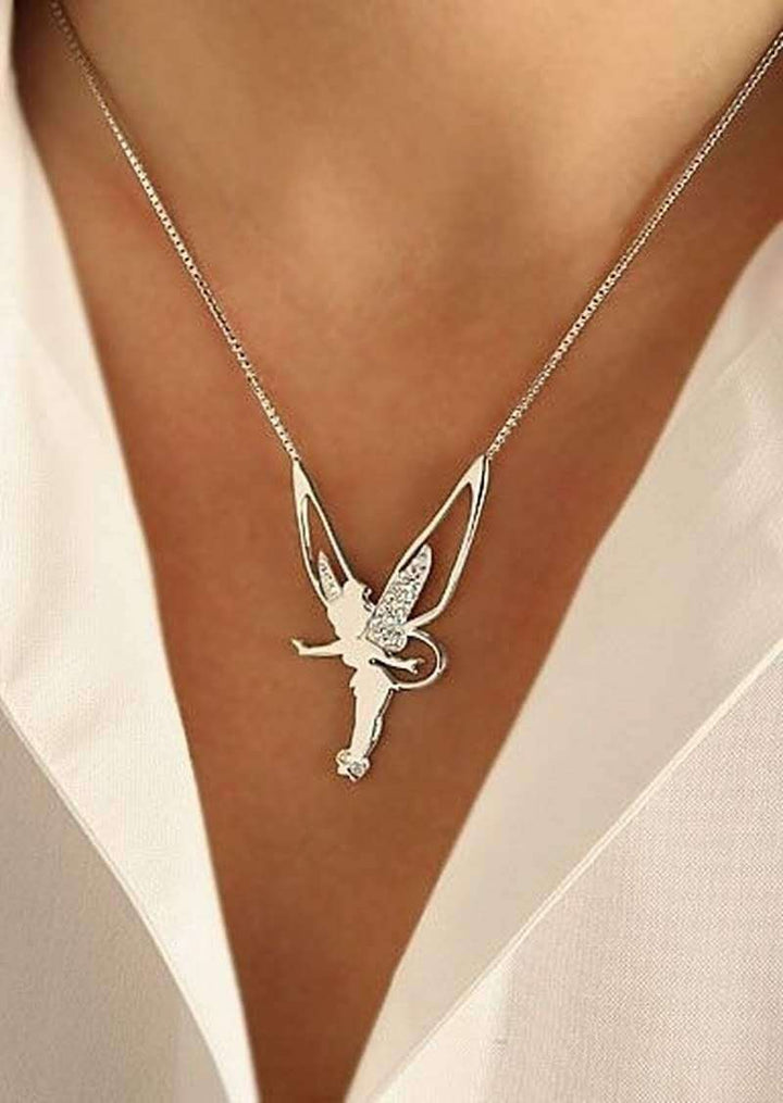 Drömlikt halsband i vitguld med delikata stjärnor