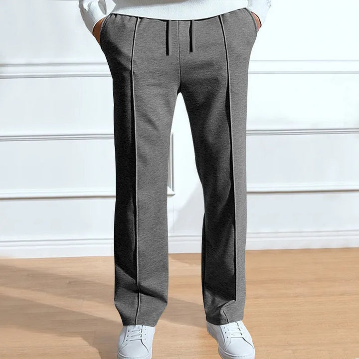 Slim fit-byxor för herr med elastisk midja och dragsko