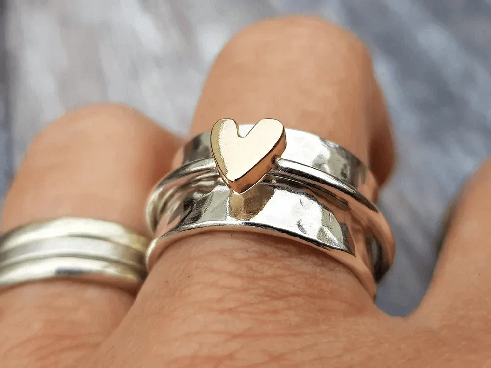 Silverring med guldhjärta