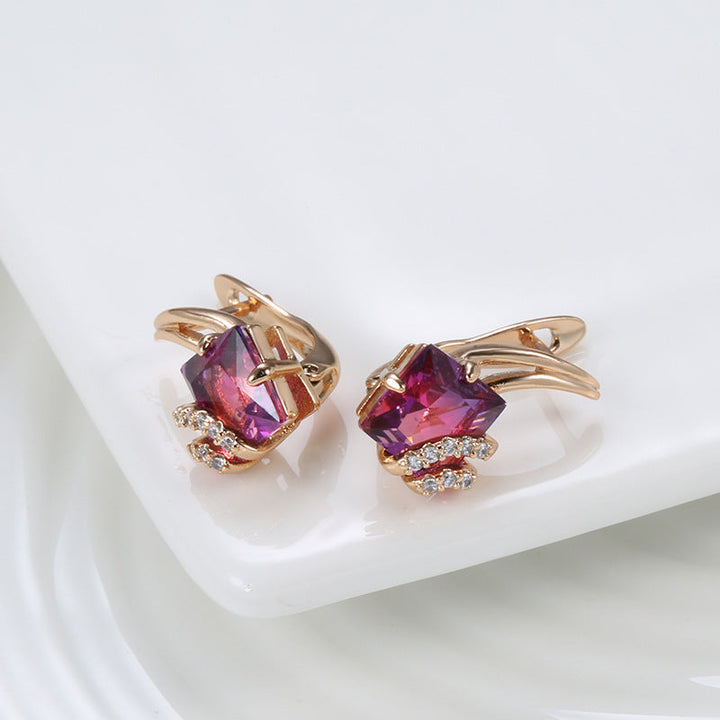Eleganta örhängen i roséguld med fyrkantig zirkonia