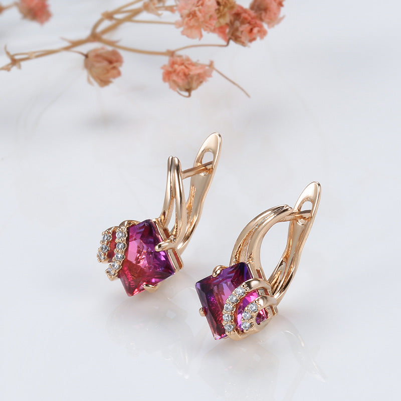 Eleganta örhängen i roséguld med fyrkantig zirkonia
