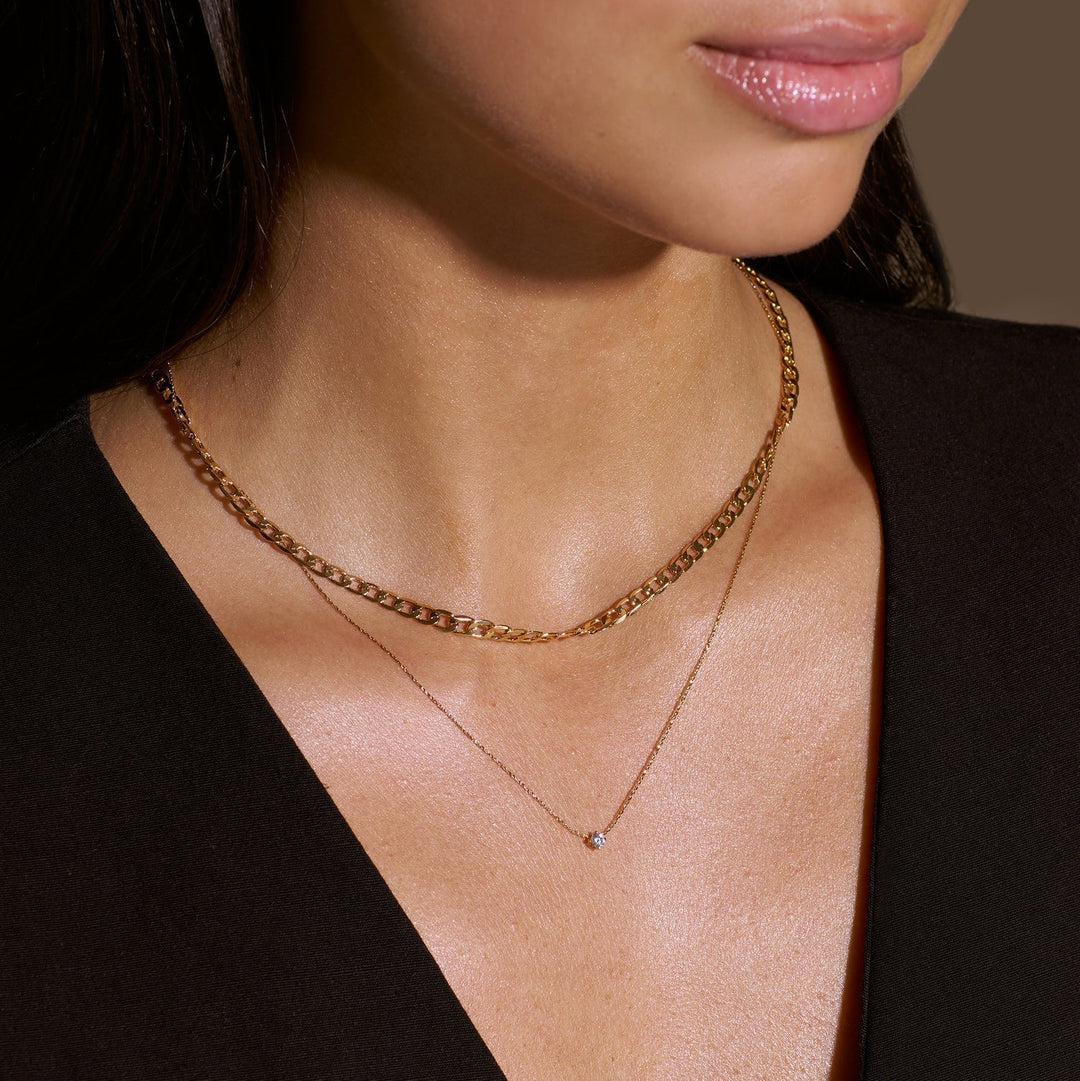 Elegant halsband i vitguld med platt länk