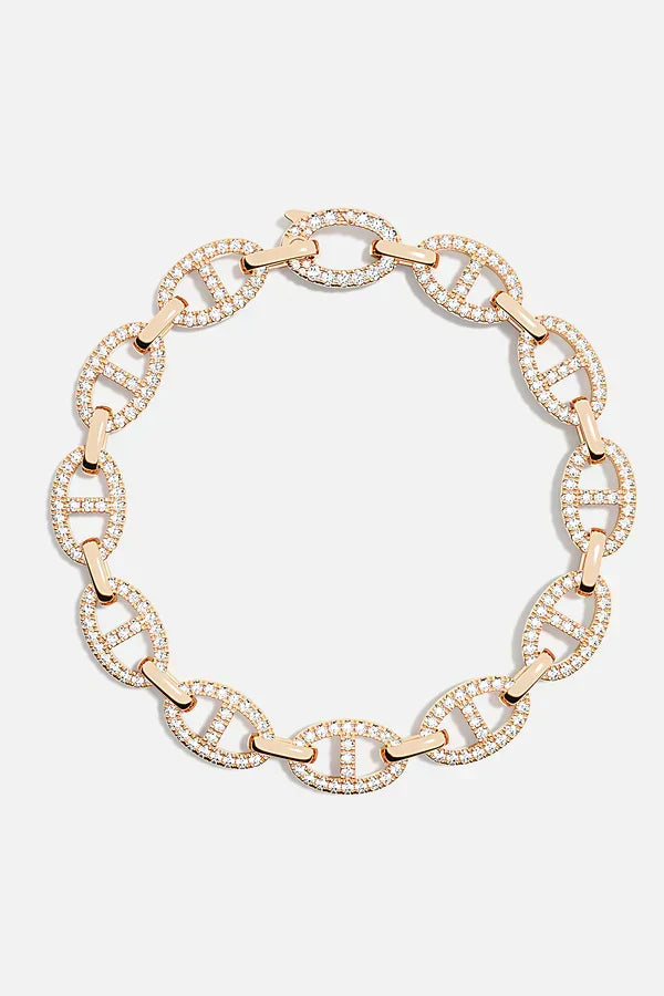 Mjukt armband i vitguld med delikata detaljer