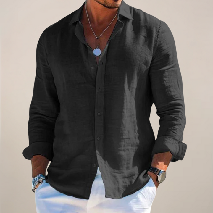 Lös herrskjorta i linne med knäppning och långa ärmar