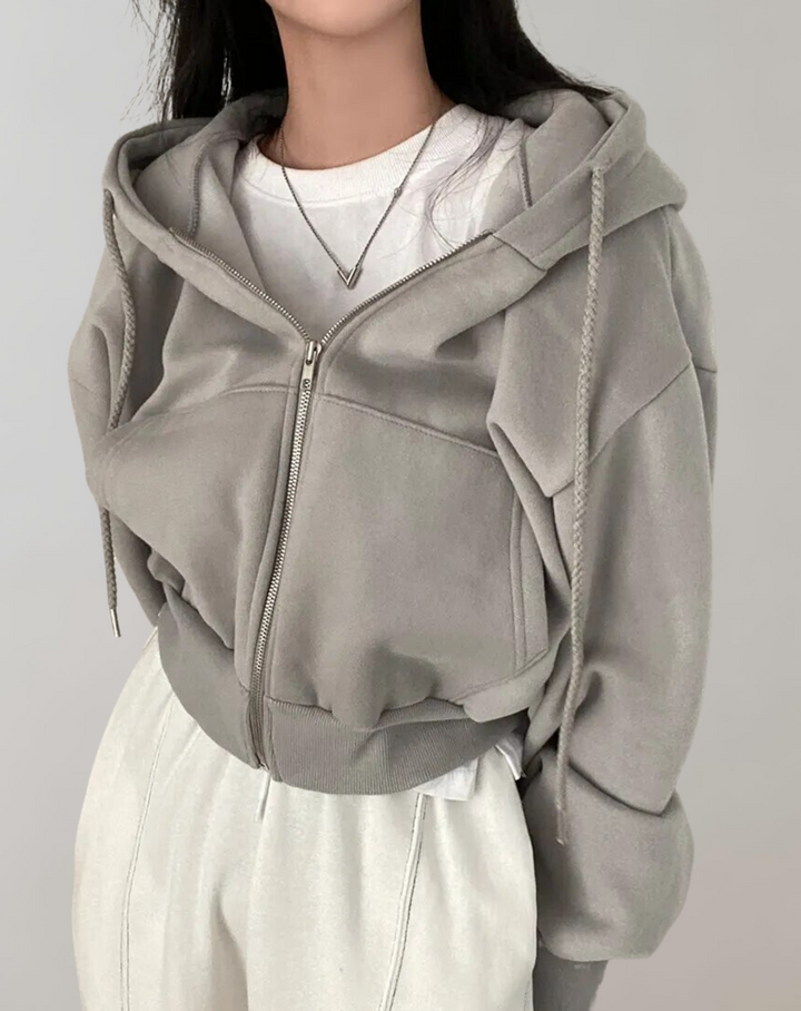 Hoodie för dam med dragkedja och huva med dragsko samt ribbade muddar