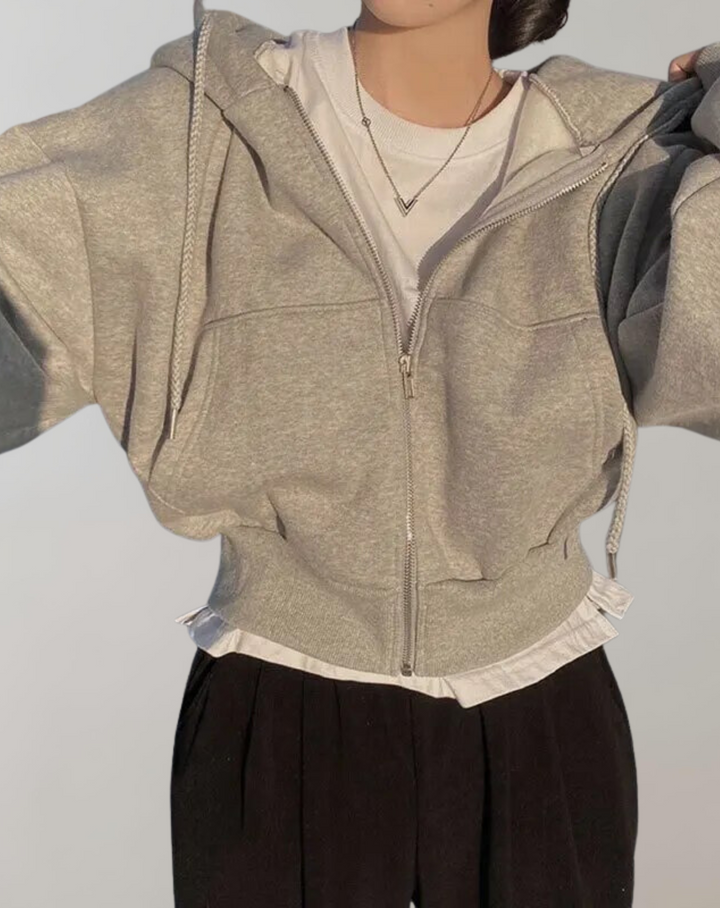 Hoodie för dam med dragkedja och huva med dragsko samt ribbade muddar