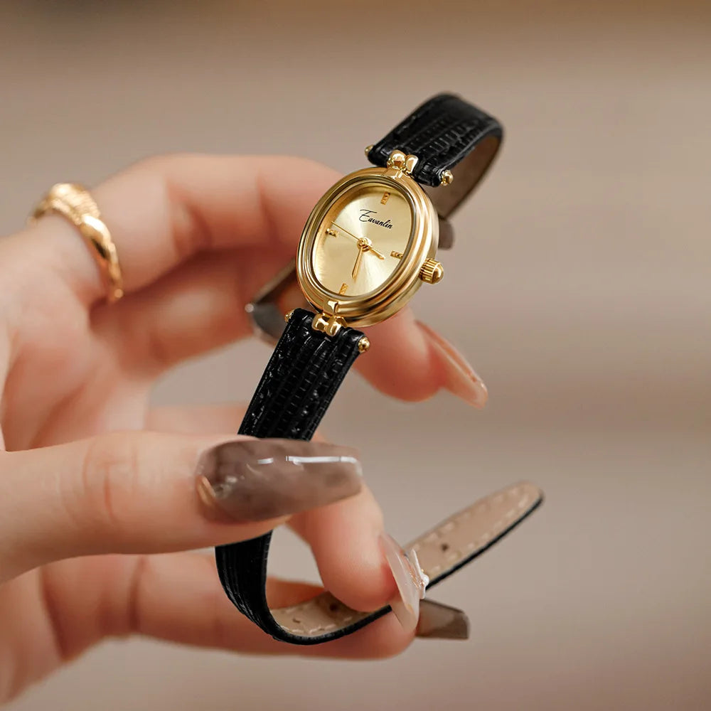 Sienna - elegant kvartsklocka med guldfärgat armband