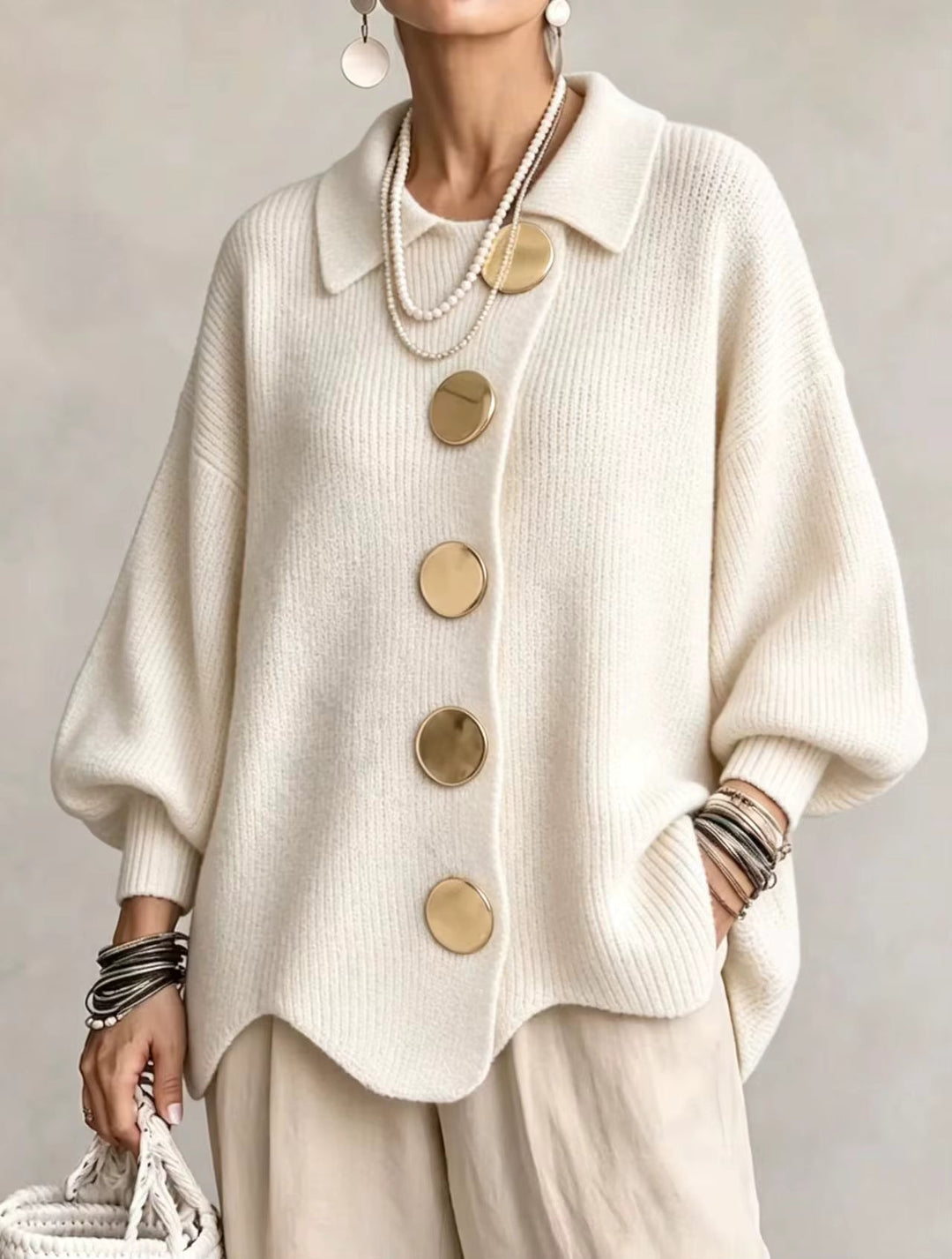 Elegant oversized-cardigan med iögonfallande knappar