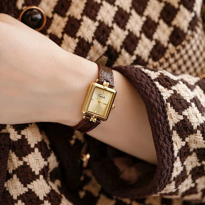 Sienna - elegant kvartsklocka med guldfärgat armband