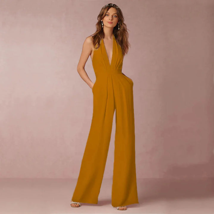 Djup V-ringad rygglös jumpsuit